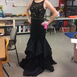 Jovani size 10 has been altered with zipper repair